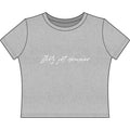 "Flirty Yet Demure" Women's Baby Tee — Script Graphic Crop T-Shirt