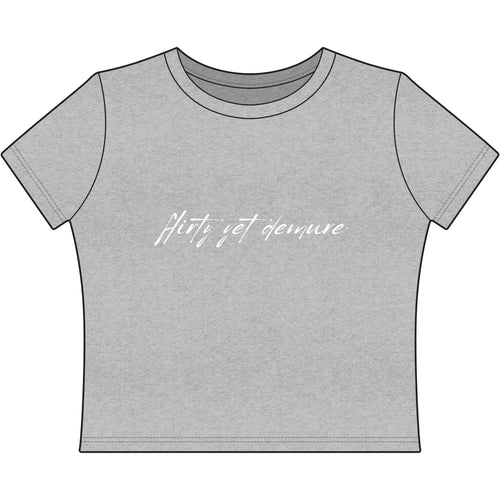 "Flirty Yet Demure" Women's Baby Tee — Script Graphic Crop T-Shirt