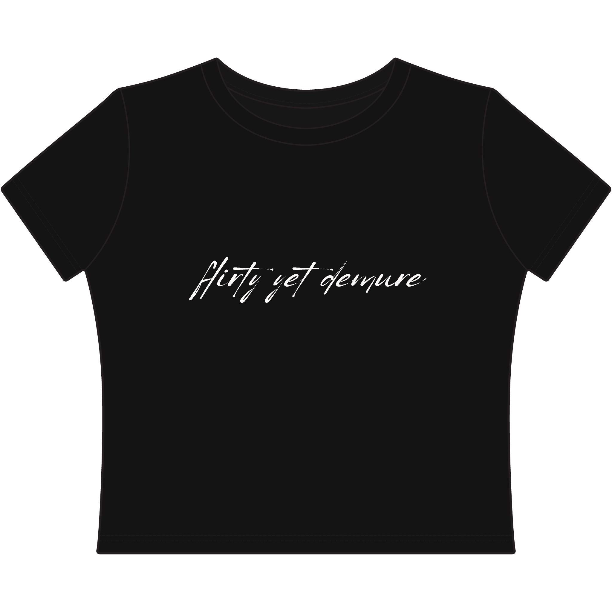 "Flirty Yet Demure" Women's Baby Tee — Script Graphic Crop T-Shirt