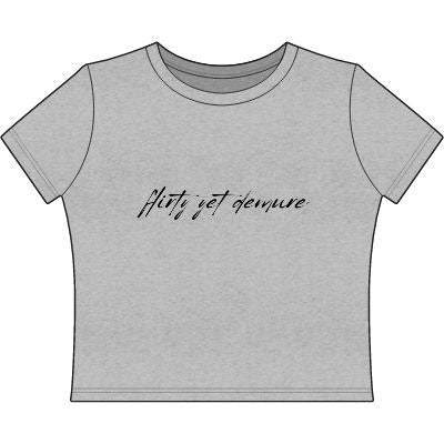 "Flirty Yet Demure" Women's Baby Tee — Script Graphic Crop T-Shirt